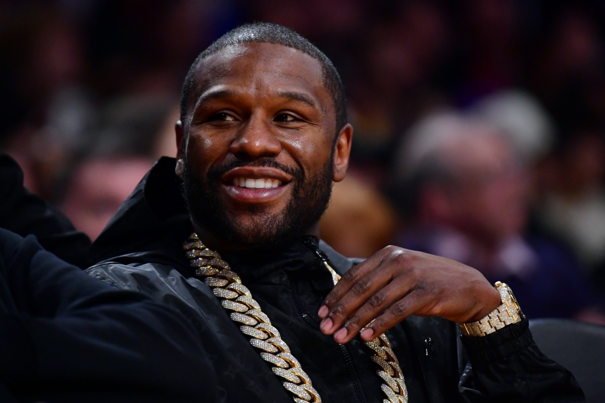 International Boxing Hall of Famer Floyd Mayweather attends an NBA game between the Los Angeles Lakers and the Oklahoma City Thunder inside the Crypto.com Arena.